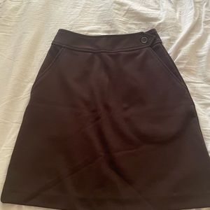 Knee length brown skirt
